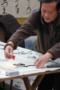 Stamping calligraphy outside of Wenshu.