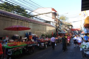 Vendors sell fruit in Bangkok's Chinatown.