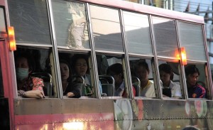Old-school buses trundle through Chinatown's busy streets.