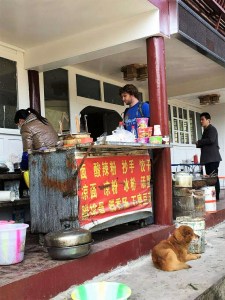 I buy more sour spicy rice noodles for lunch from this very clean-looking noodle stand.